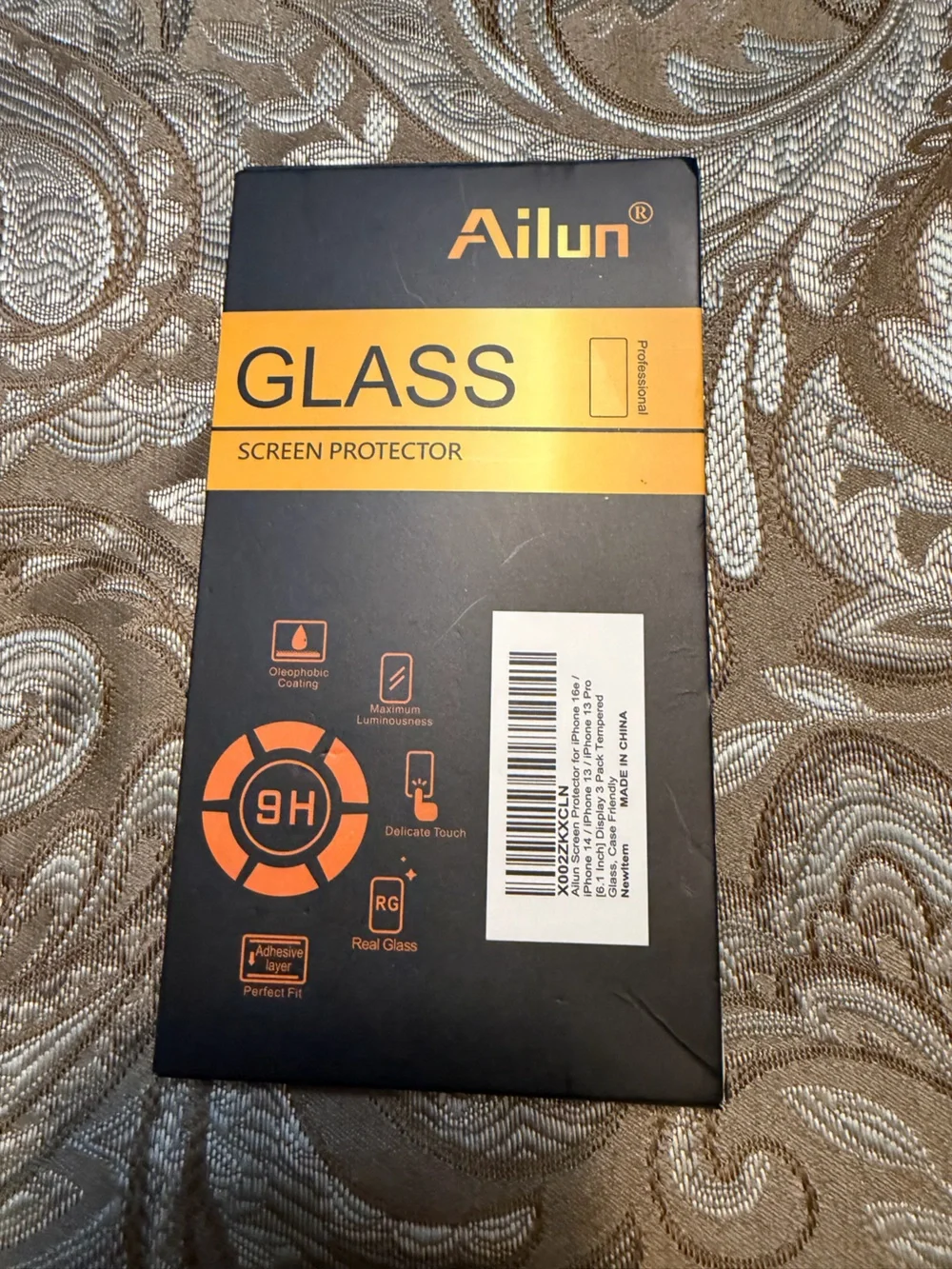 Ailun Glass Screen Protector in Black and Orange Packaging